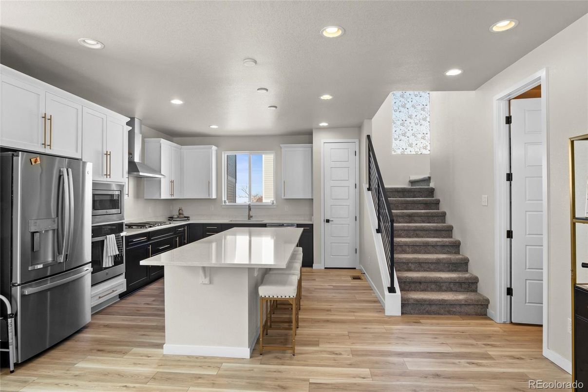 Interior, Kitchen, Recessed Lighting, Stainless Steel Appliances, Wood Texture Flooring