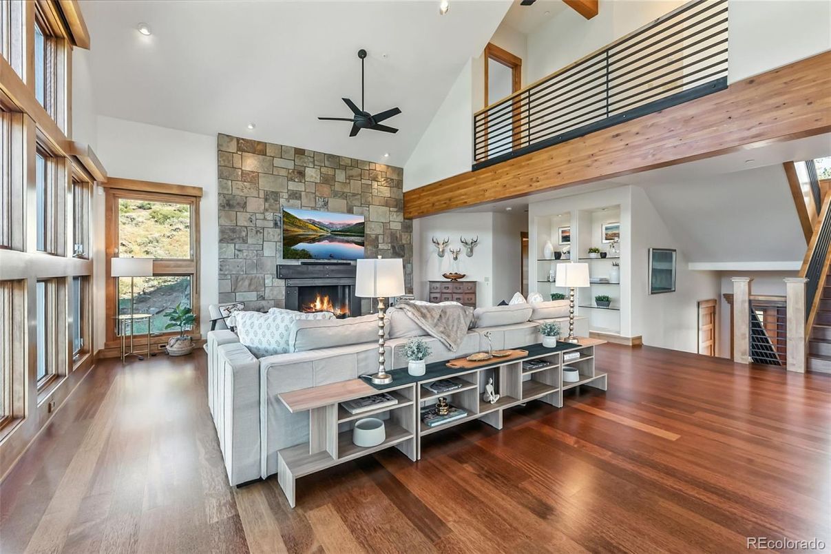 Fireplace, Interior, Living room, Recessed Lighting, Stone Walls, Wooden Beams, Wood Texture Flooring