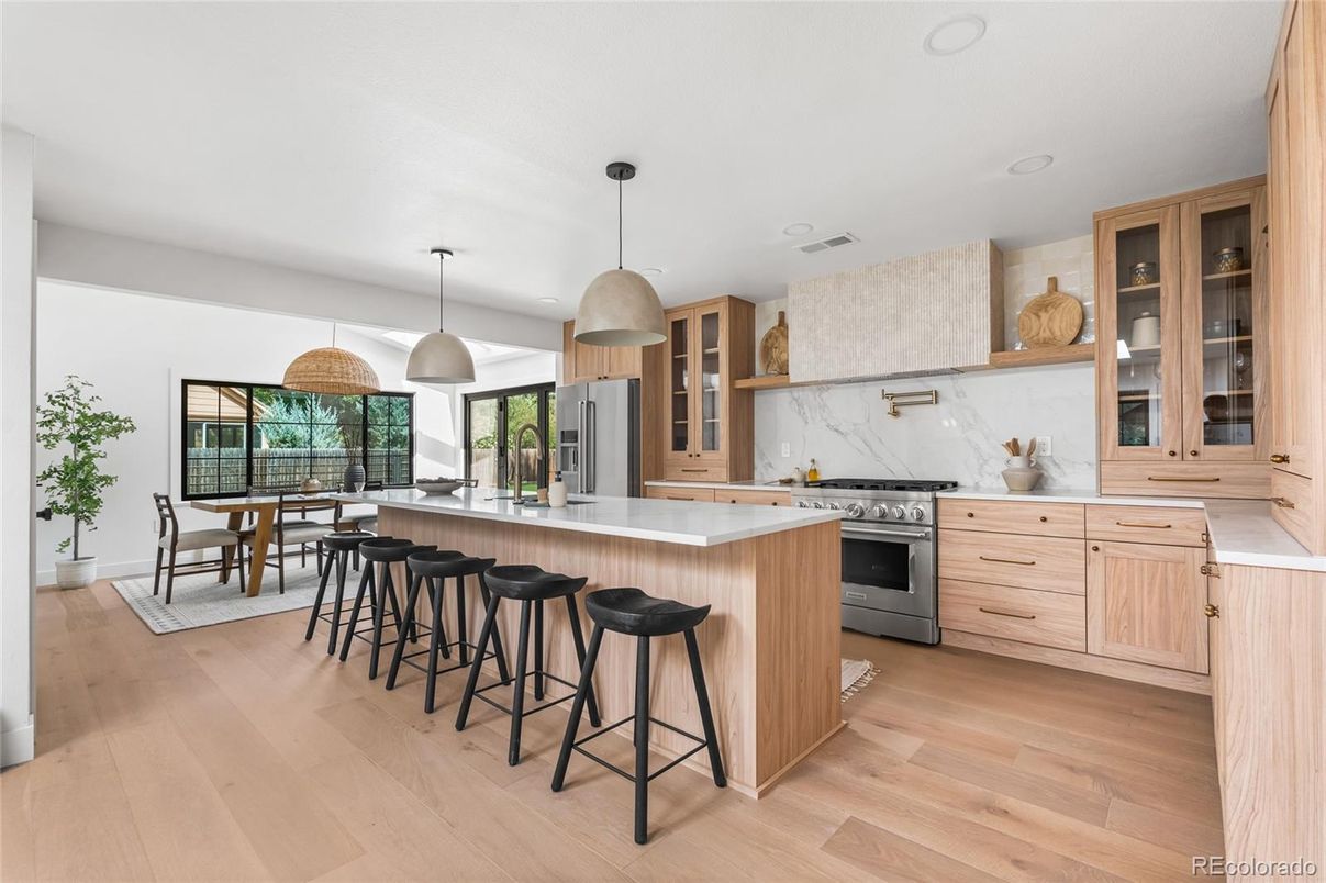 Dining room, Interior, Kitchen, Marble Walls, Pendant Lights, Stainless Steel Appliances, Wood Texture Flooring