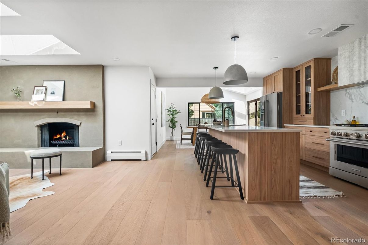 Fireplace, Interior, Kitchen, Pendant Lights, Recessed Lighting, Stainless Steel Appliances, Wood Texture Flooring