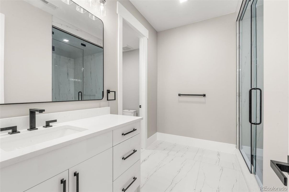 Bathroom, Dual Sink Vanities, Glass Shower, Interior, Marble, Recessed Lighting