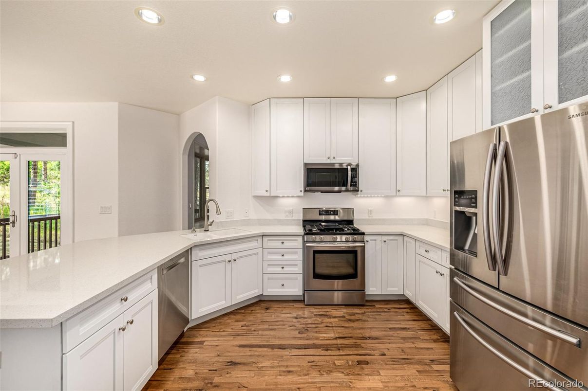 Interior, Kitchen, Recessed Lighting, Stainless Steel Appliances, Wood Texture Flooring