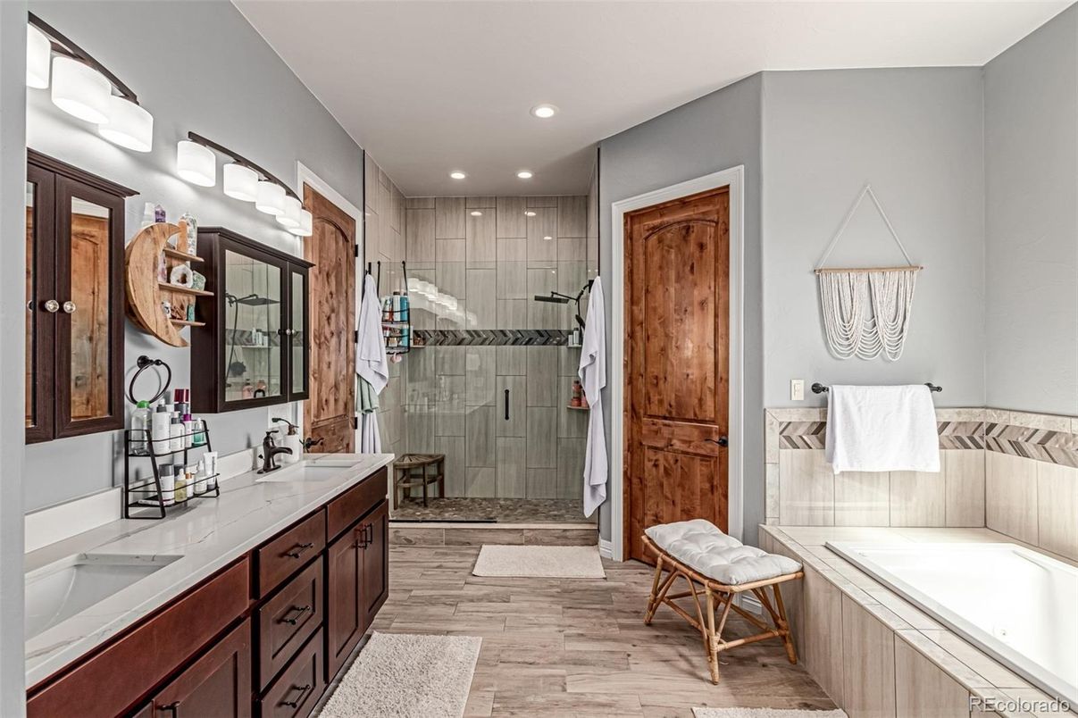 Bathroom, Dual Sink Vanities, Glass Shower, Interior, Recessed Lighting, Wood Texture Flooring