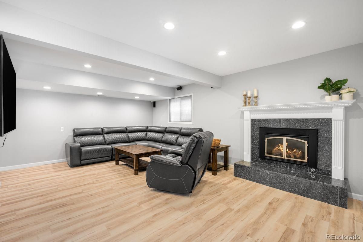 Fireplace, Interior, Living room, Recessed Lighting, Wood Texture Flooring