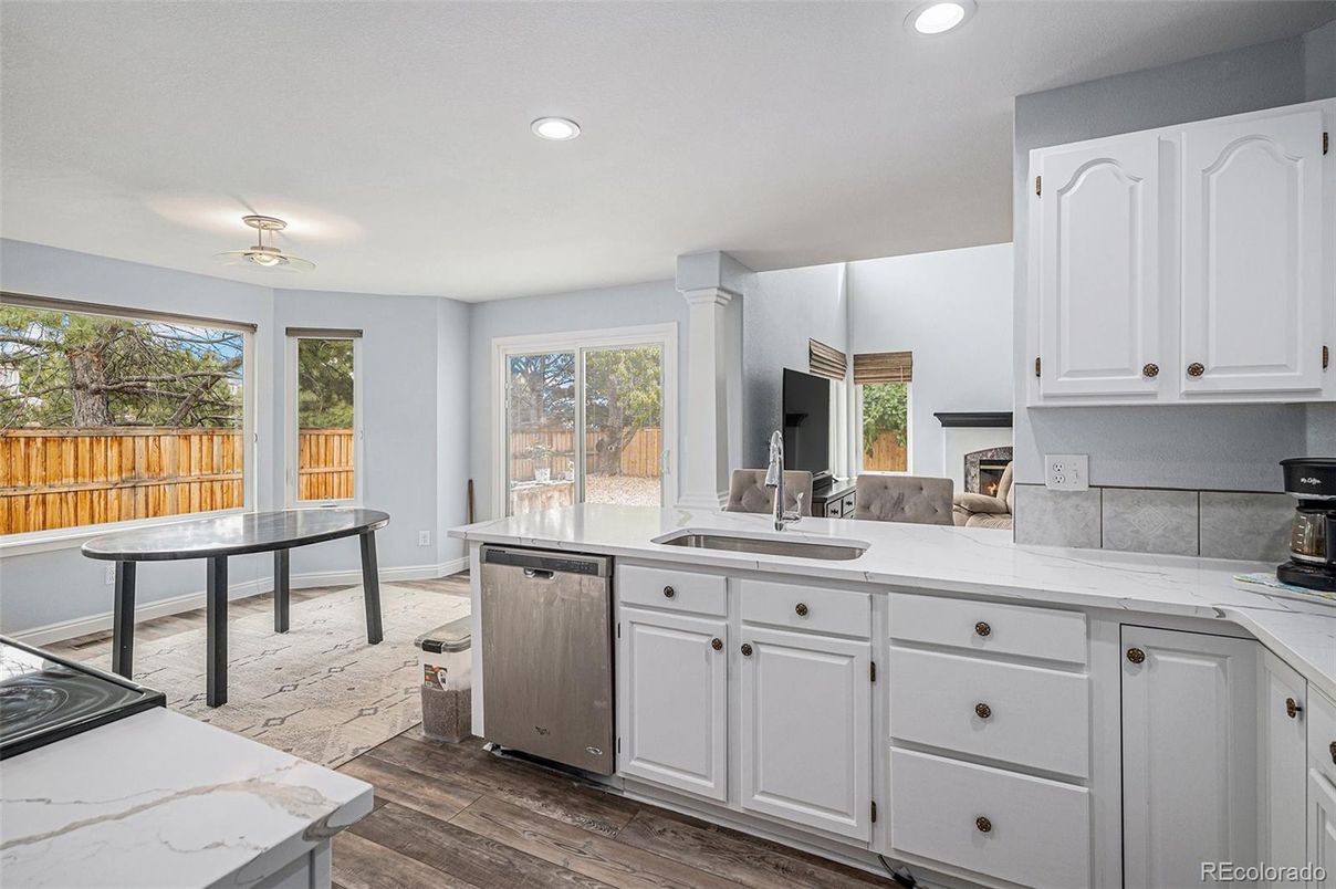 Fireplace, Interior, Kitchen, Recessed Lighting, Wood Texture Flooring