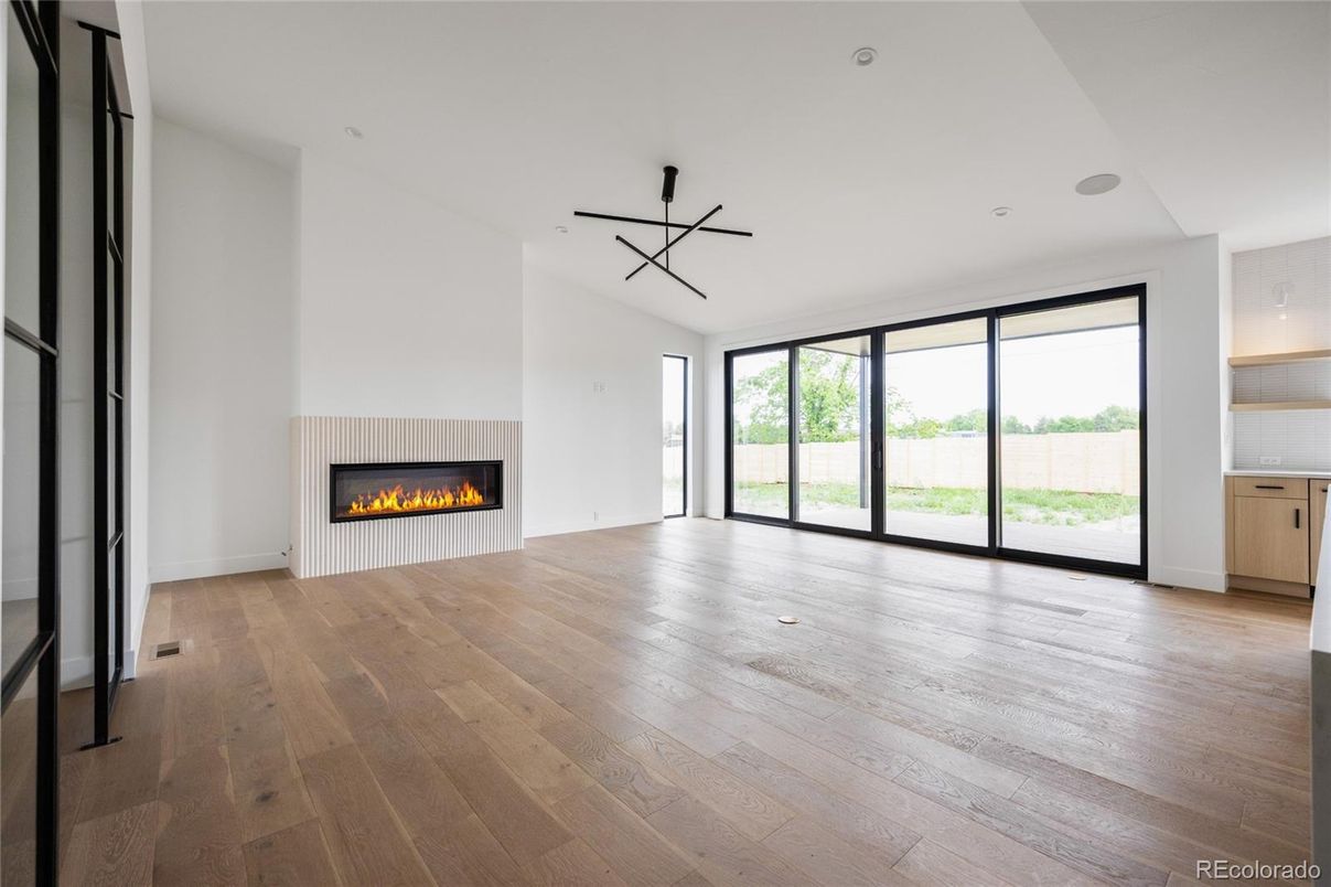 Empty room, Fireplace, Interior, Recessed Lighting, Wood Texture Flooring