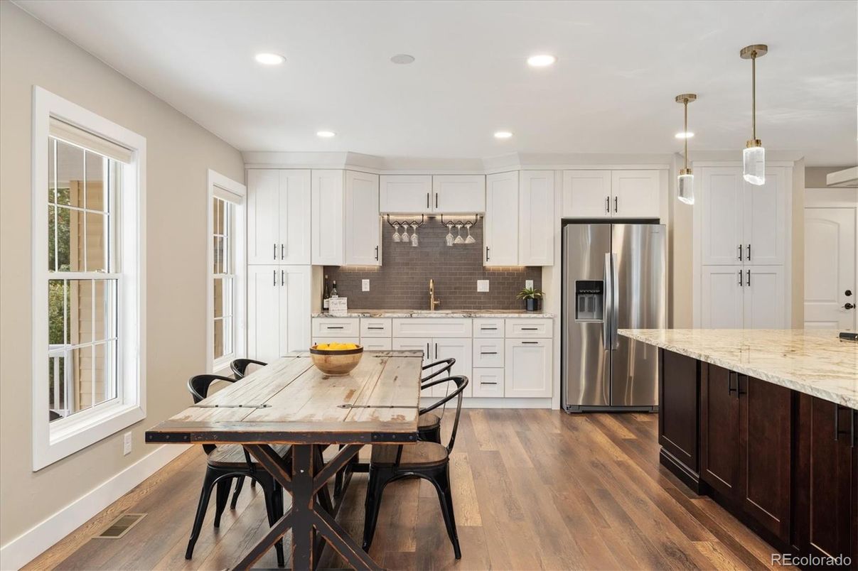 Dining room, Interior, Kitchen, Pendant Lights, Recessed Lighting, Stainless Steel Appliances, Wood Texture Flooring
