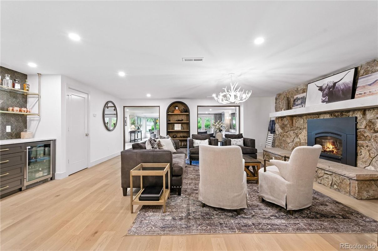 Chandelier, Fireplace, Interior, Living room, Recessed Lighting, Wood Texture Flooring