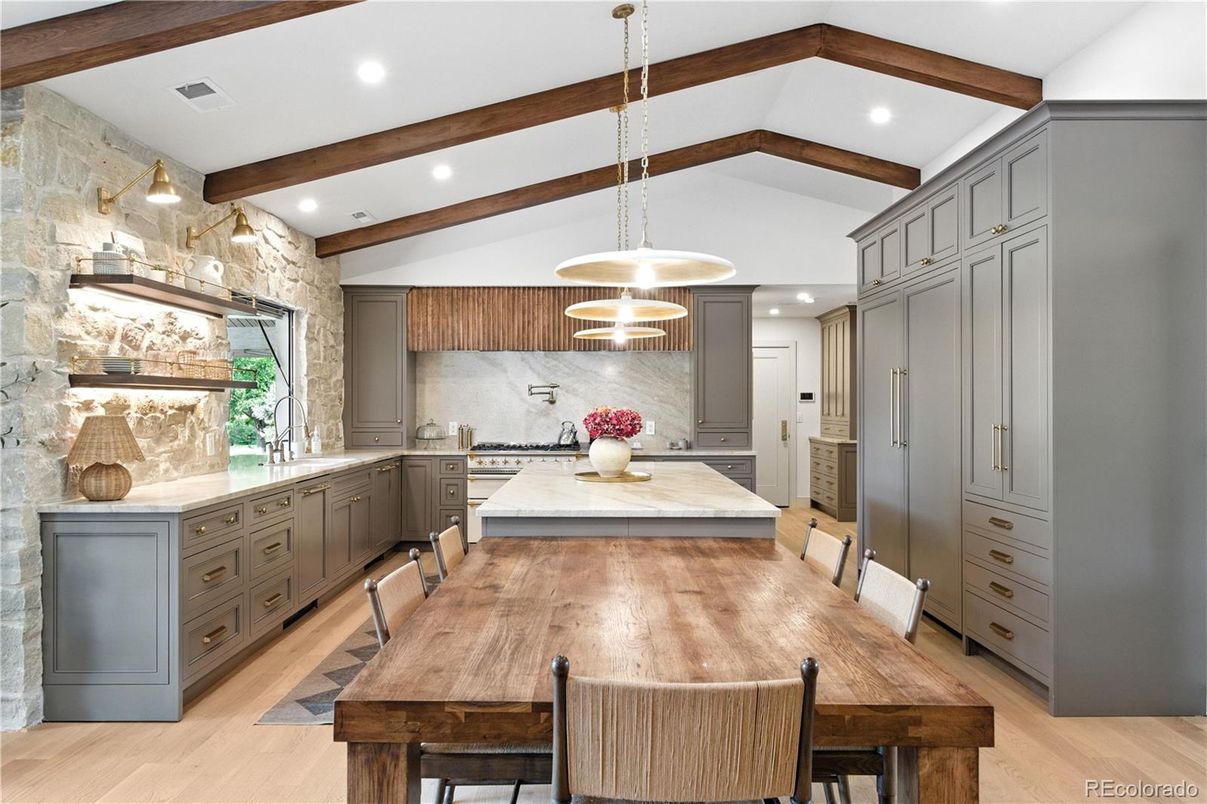 Dining room, Interior, Kitchen, Pendant Lights, Recessed Lighting, Stainless Steel Appliances, Stone Walls, Wooden Beams, Wood Texture Flooring