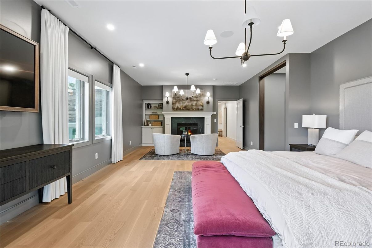 Bedroom, Chandelier, Fireplace, Interior, Recessed Lighting, Wood Texture Flooring