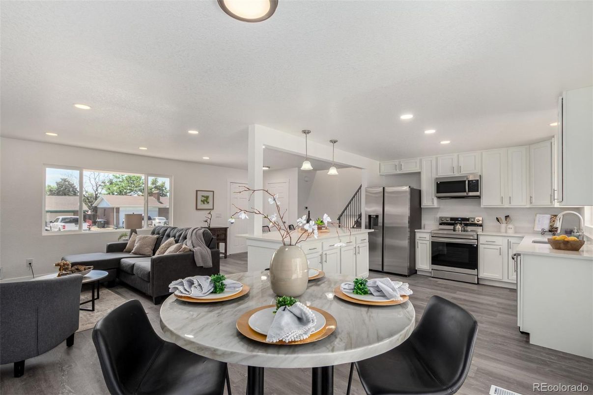 Dining room, Interior, Kitchen, Living room, Pendant Lights, Recessed Lighting, Stainless Steel Appliances, Wood Texture Flooring