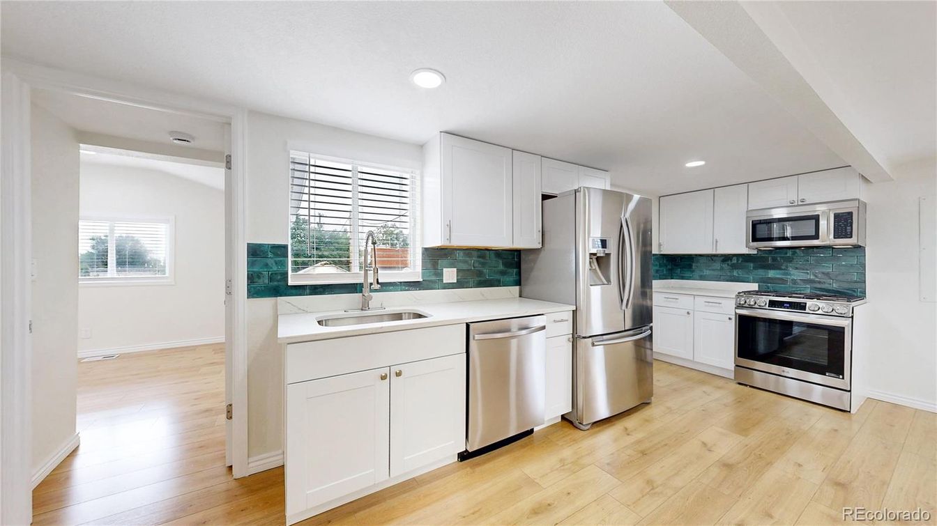 Interior, Kitchen, Recessed Lighting, Stainless Steel Appliances, Wood Texture Flooring