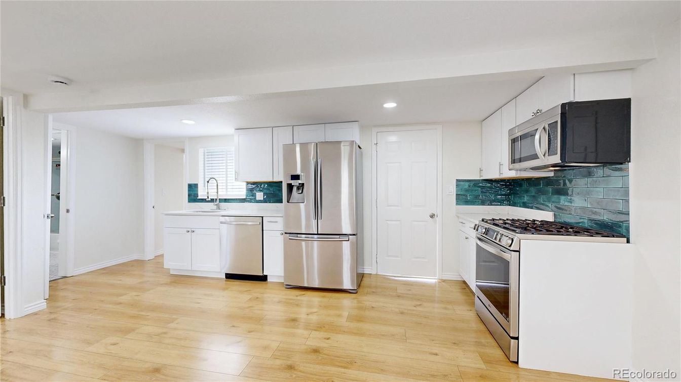 Interior, Kitchen, Recessed Lighting, Stainless Steel Appliances, Wood Texture Flooring