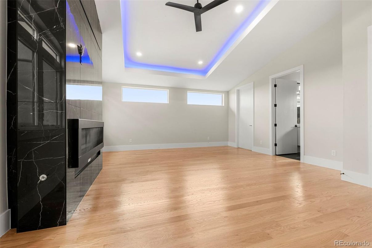 Empty room, Fireplace, Interior, Recessed Lighting, Wood Texture Flooring