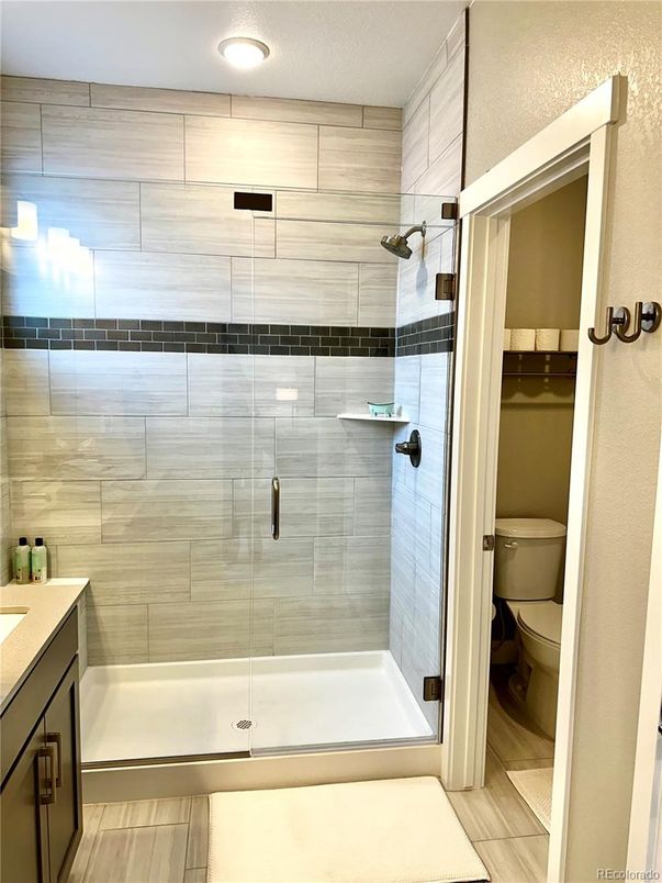 Bathroom, Glass Shower, Interior, Recessed Lighting, Wood Texture Flooring