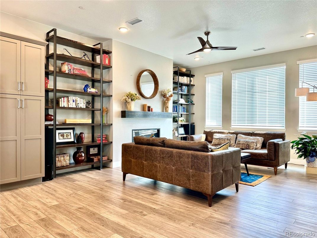 Fireplace, Interior, Living room, Recessed Lighting, Wood Texture Flooring