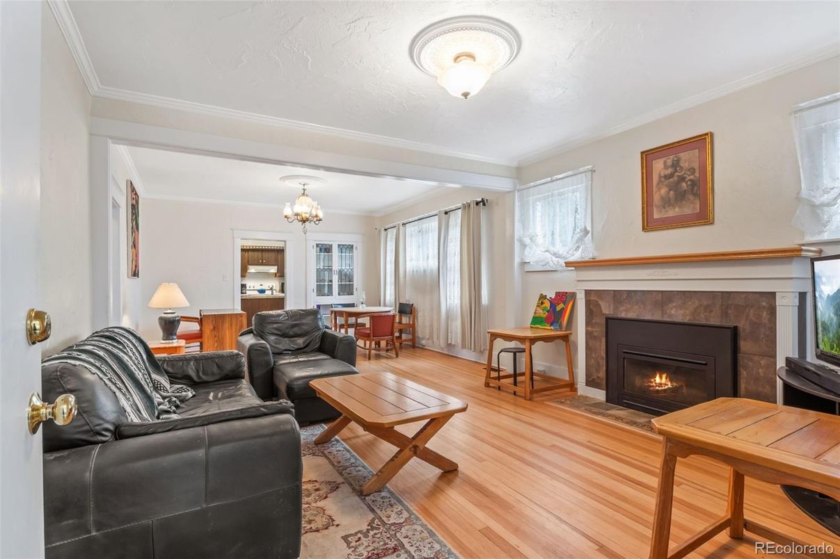 Chandelier, Dining room, Fireplace, Interior, Living room, Wood Texture Flooring