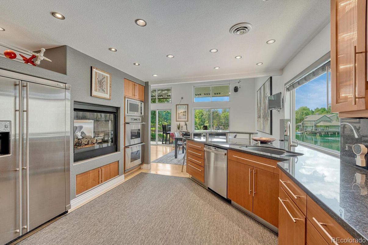 Fireplace, Interior, Kitchen, Recessed Lighting, Stainless Steel Appliances