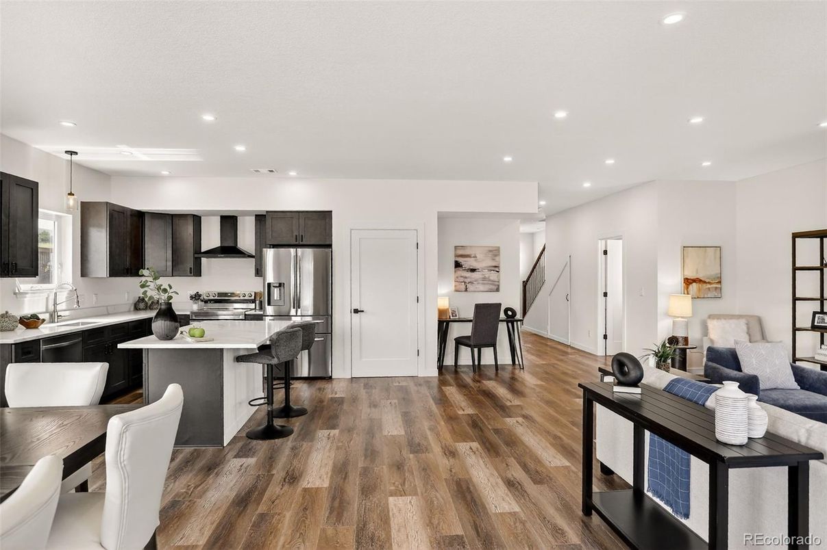Dining room, Interior, Kitchen, Recessed Lighting, Stainless Steel Appliances, Wood Texture Flooring
