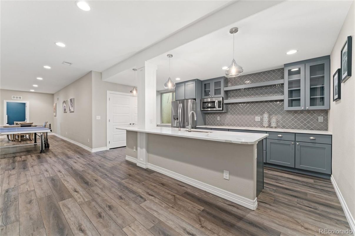 Interior, Kitchen, Pendant Lights, Recessed Lighting, Stainless Steel Appliances, Wood Texture Flooring