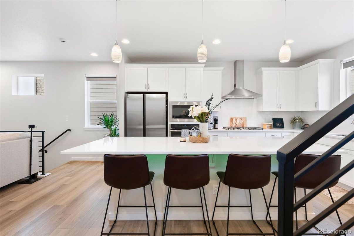 Interior, Kitchen, Pendant Lights, Recessed Lighting, Stainless Steel Appliances, Wood Texture Flooring
