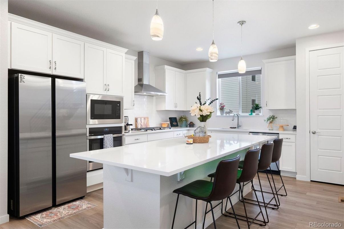 Interior, Kitchen, Pendant Lights, Recessed Lighting, Stainless Steel Appliances, Wood Texture Flooring