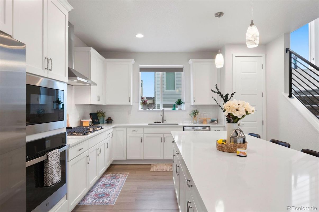 Interior, Kitchen, Pendant Lights, Recessed Lighting, Stainless Steel Appliances, Wood Texture Flooring