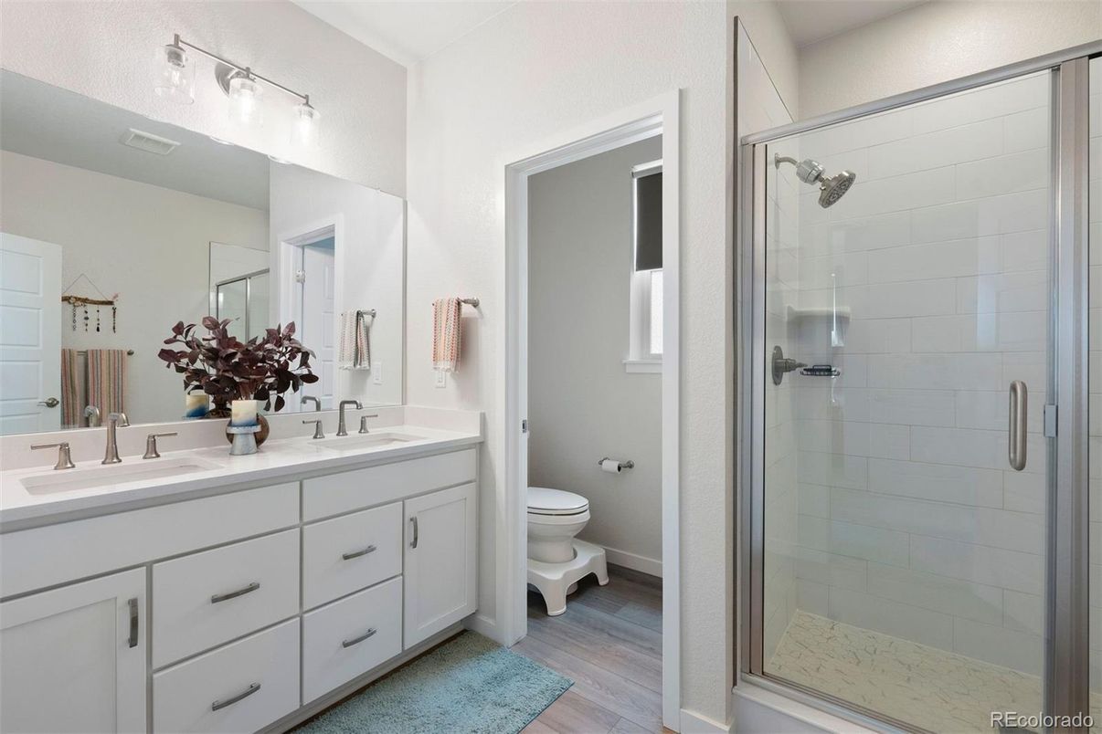 Bathroom, Dual Sink Vanities, Glass Shower, Interior, Wood Texture Flooring