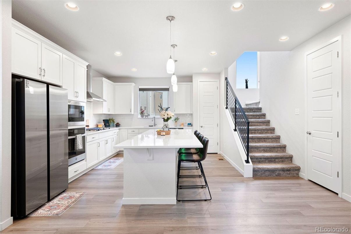 Interior, Kitchen, Pendant Lights, Recessed Lighting, Stainless Steel Appliances, Wood Texture Flooring