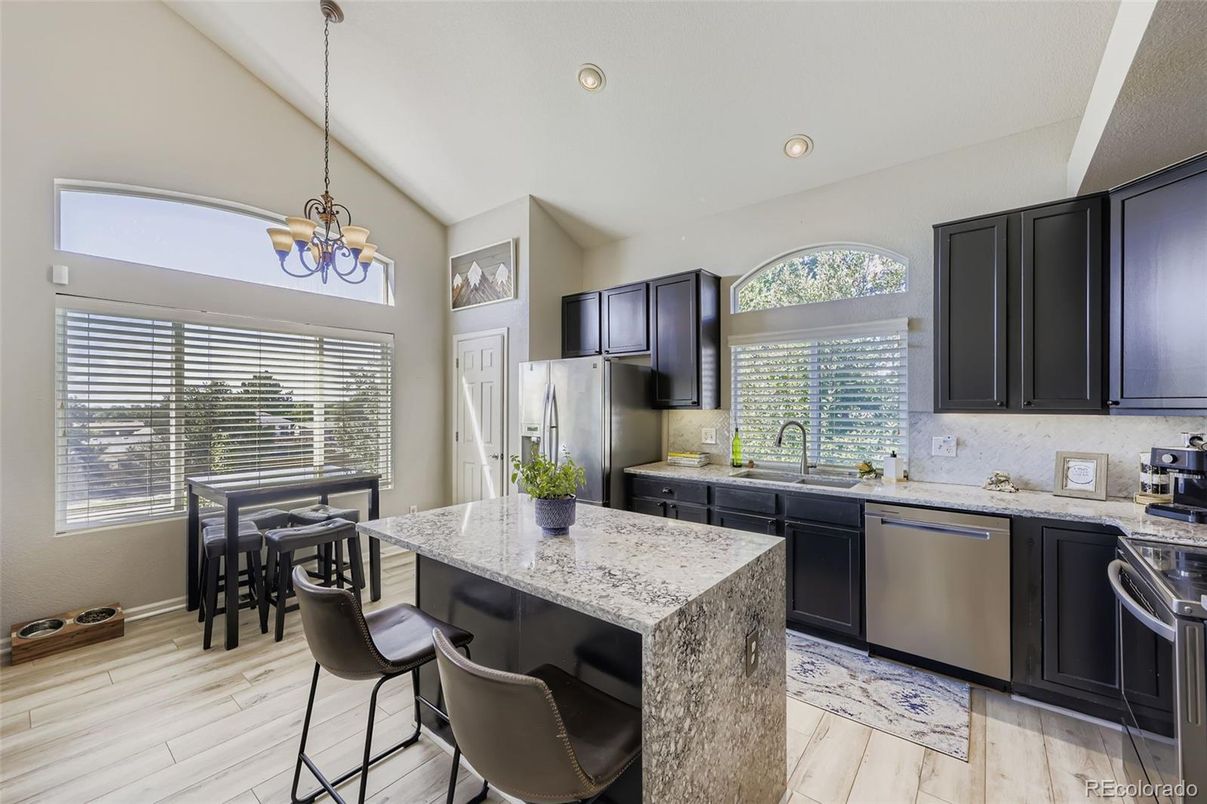 Chandelier, Interior, Kitchen, Pendant Lights, Recessed Lighting, Stainless Steel Appliances, Wood Texture Flooring