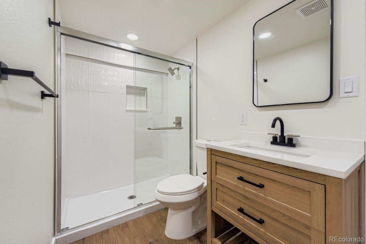 Bathroom, Glass Shower, Interior, Recessed Lighting, Wood Texture Flooring