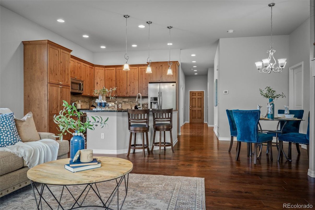 Chandelier, Dining room, Interior, Kitchen, Pendant Lights, Recessed Lighting, Stainless Steel Appliances, Wood Texture Flooring