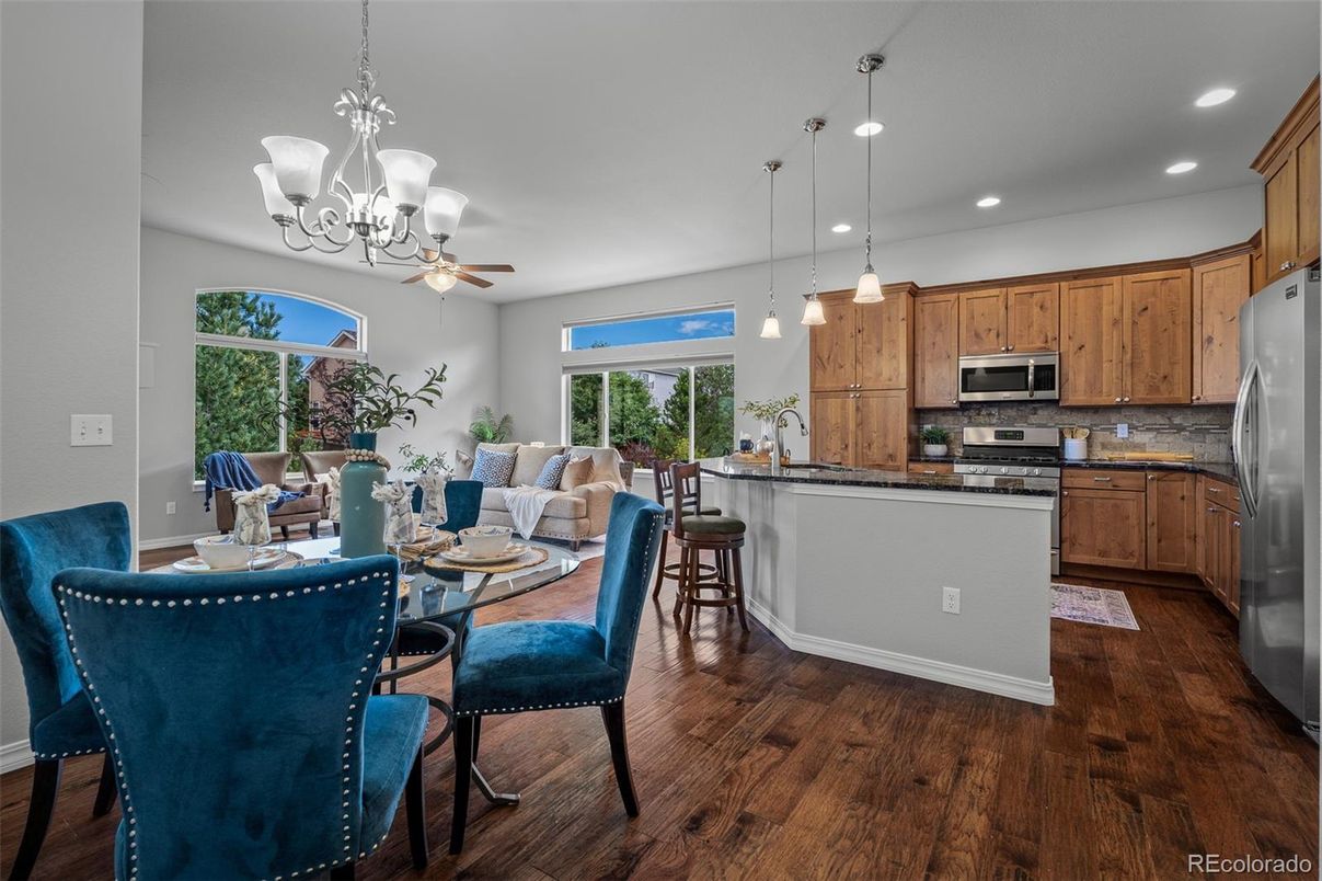 Chandelier, Dining room, Interior, Kitchen, Pendant Lights, Recessed Lighting, Stainless Steel Appliances, Wood Texture Flooring
