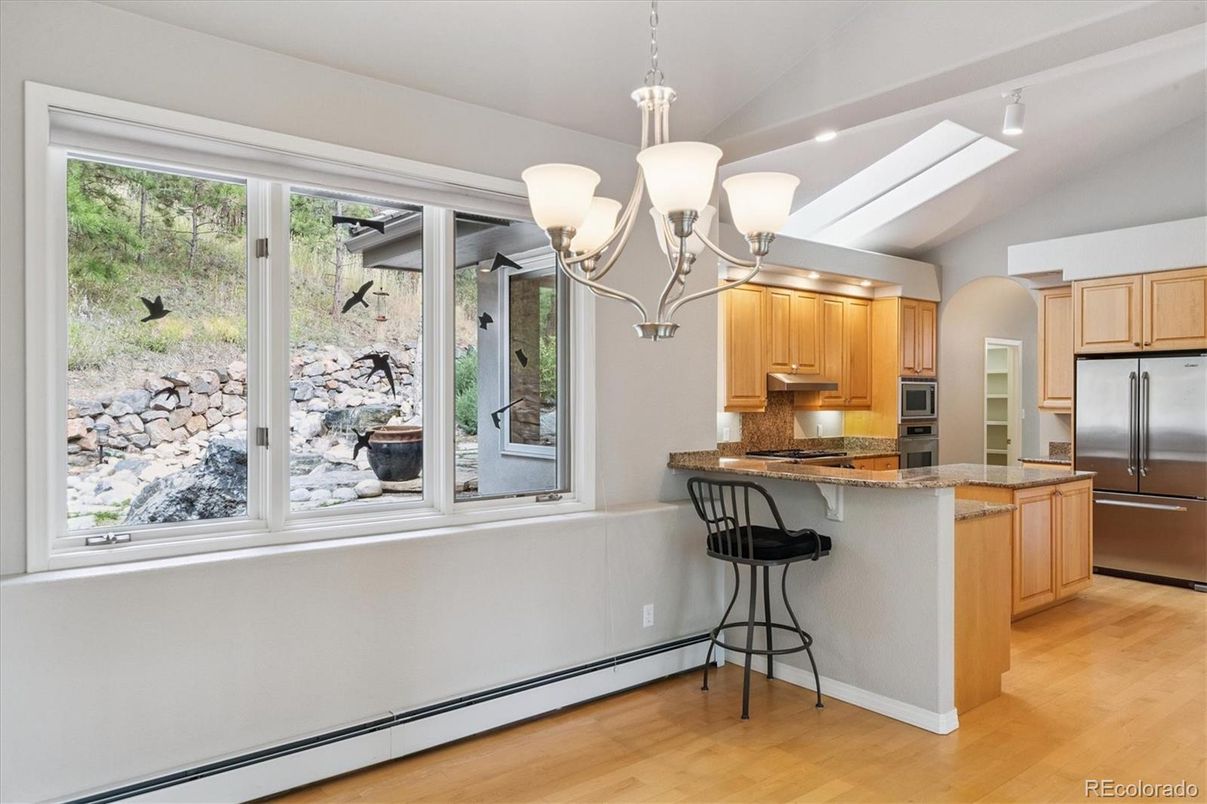Chandelier, Interior, Kitchen, Recessed Lighting, Stainless Steel Appliances, Wood Texture Flooring