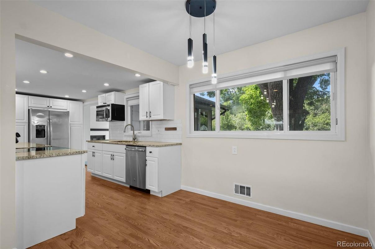 Interior, Kitchen, Pendant Lights, Recessed Lighting, Stainless Steel Appliances, Wood Texture Flooring