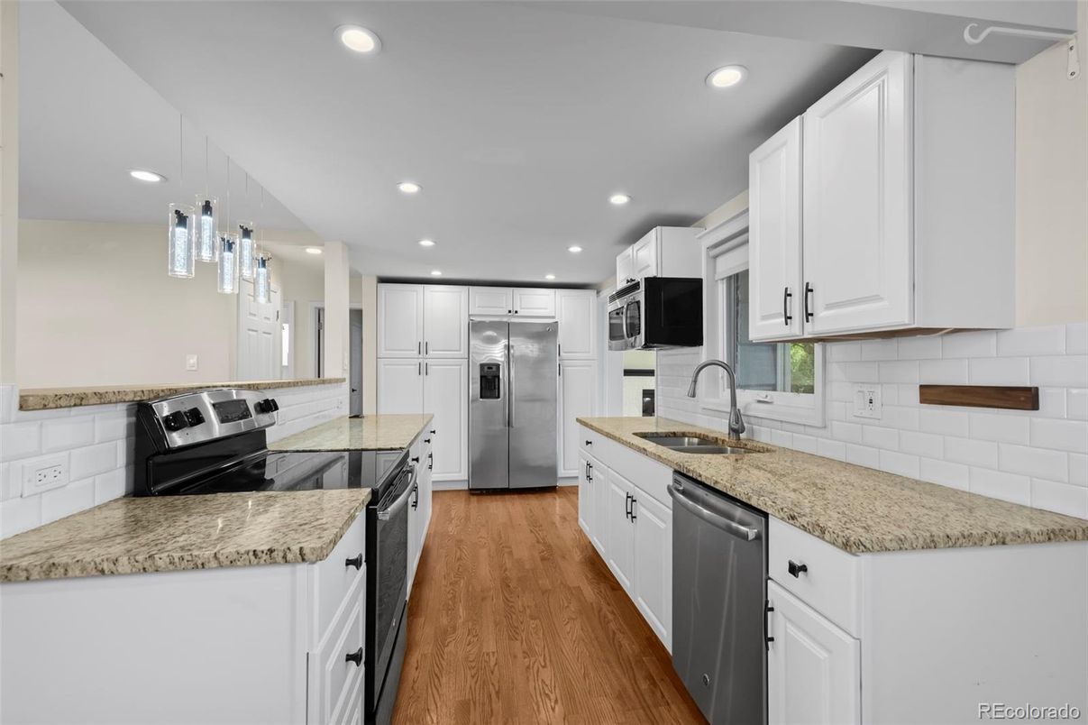 Interior, Kitchen, Pendant Lights, Recessed Lighting, Stainless Steel Appliances, Wood Texture Flooring