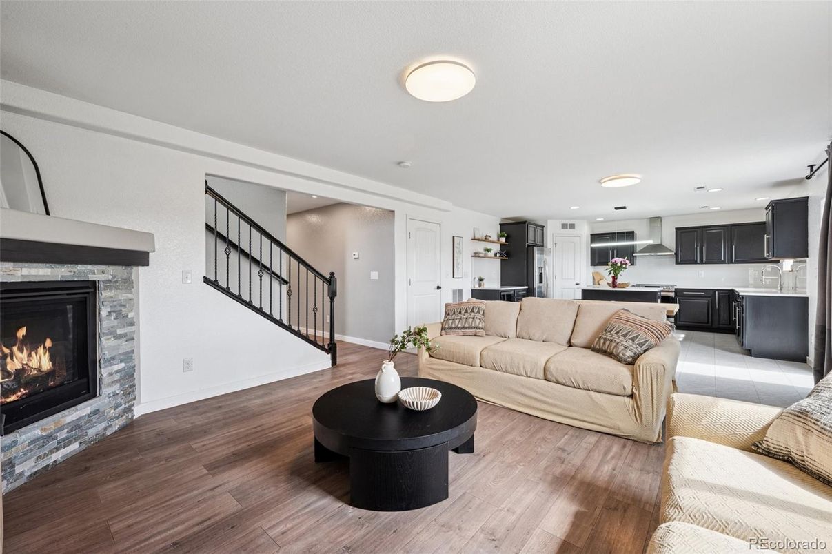 Fireplace, Interior, Kitchen, Living room, Recessed Lighting, Wood Texture Flooring