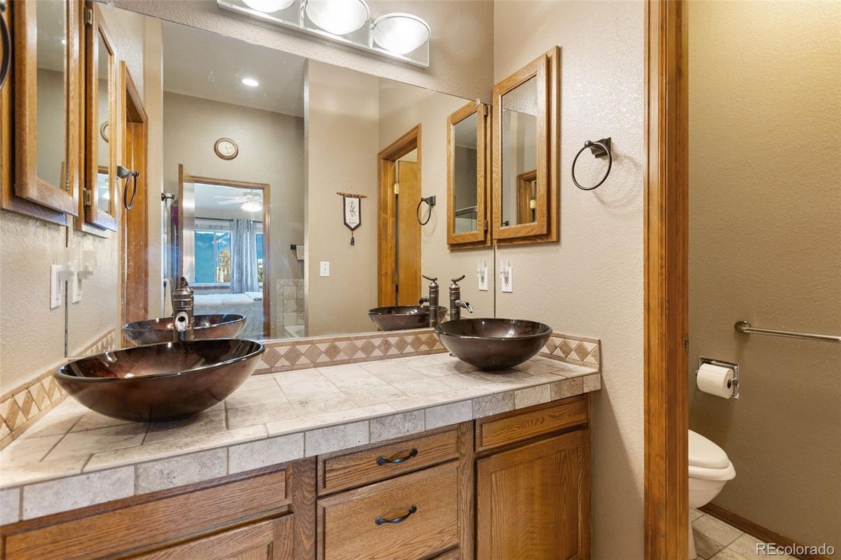 Bathroom, Dual Sink Vanities, Interior, Recessed Lighting, Tile Countertops