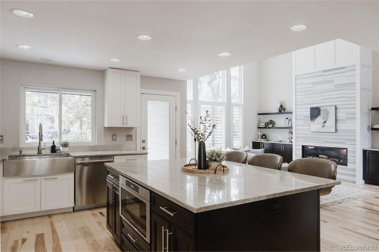 Fireplace, Interior, Kitchen, Recessed Lighting, Stainless Steel Appliances, Wood Texture Flooring