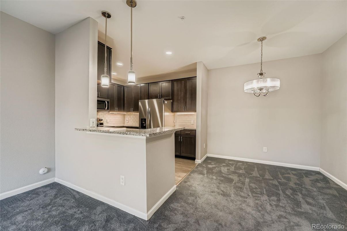 Chandelier, Empty room, Interior, Kitchen, Pendant Lights, Recessed Lighting, Stainless Steel Appliances