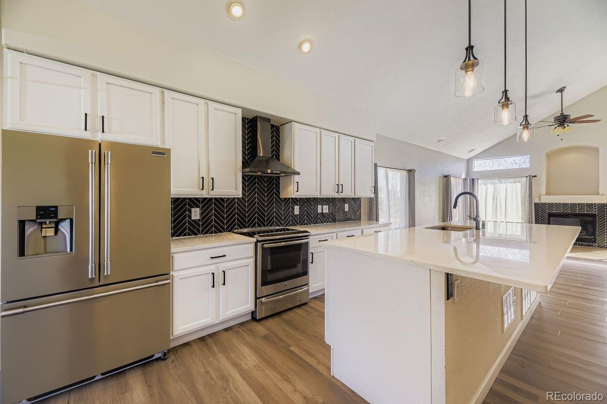 Interior, Kitchen, Pendant Lights, Recessed Lighting, Stainless Steel Appliances, Wood Texture Flooring