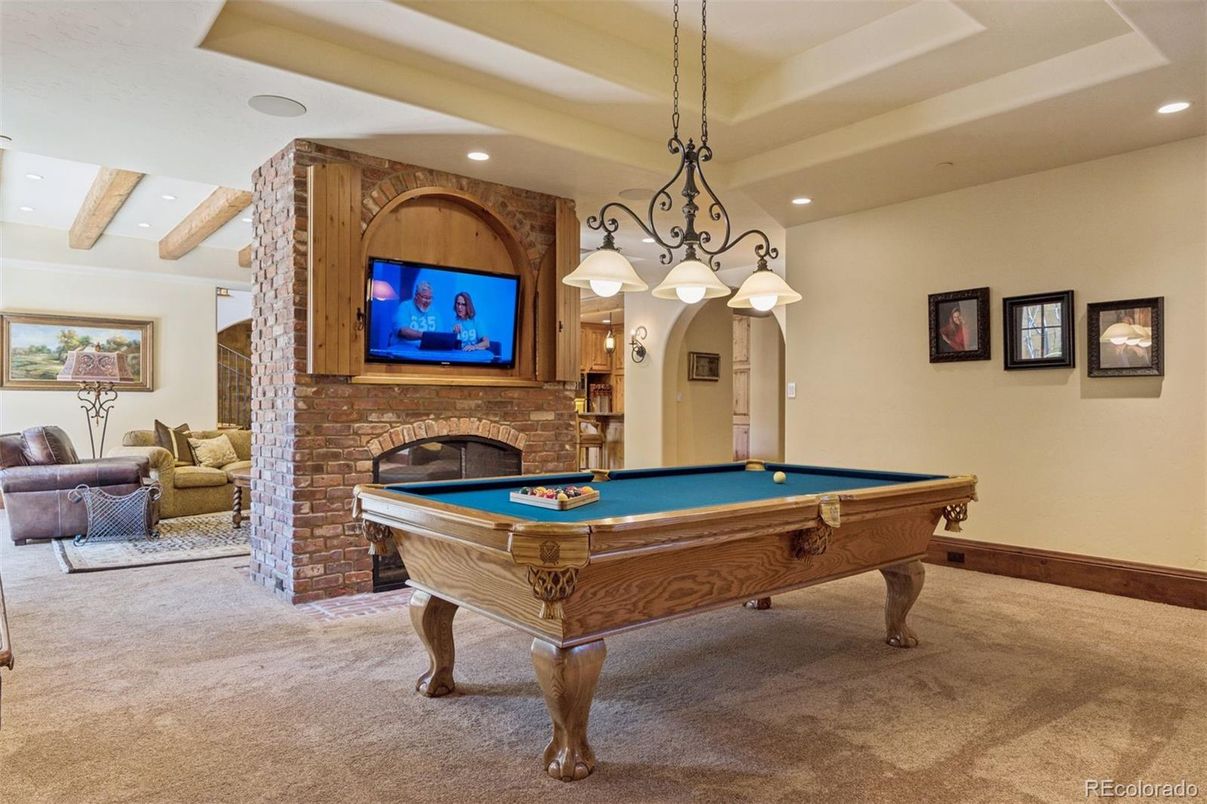 Billiard Table, Chandelier, Fireplace, Game Room, Interior, Recessed Lighting, Stone Walls, Wooden Beams