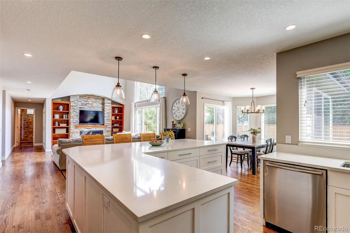 Dining room, Fireplace, Interior, Kitchen, Pendant Lights, Recessed Lighting, Stone Walls, Wood Texture Flooring