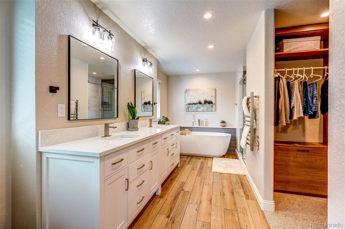 Bathroom, Dual Sink Vanities, Free Standing Baths, Interior, Recessed Lighting, Walk-in Closets, Wood Texture Flooring