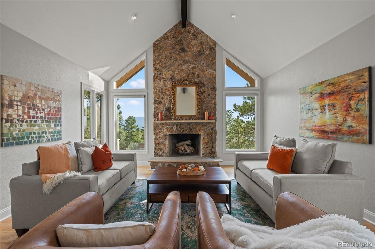Fireplace, Interior, Living room, Recessed Lighting, Stone Walls, Wood Texture Flooring