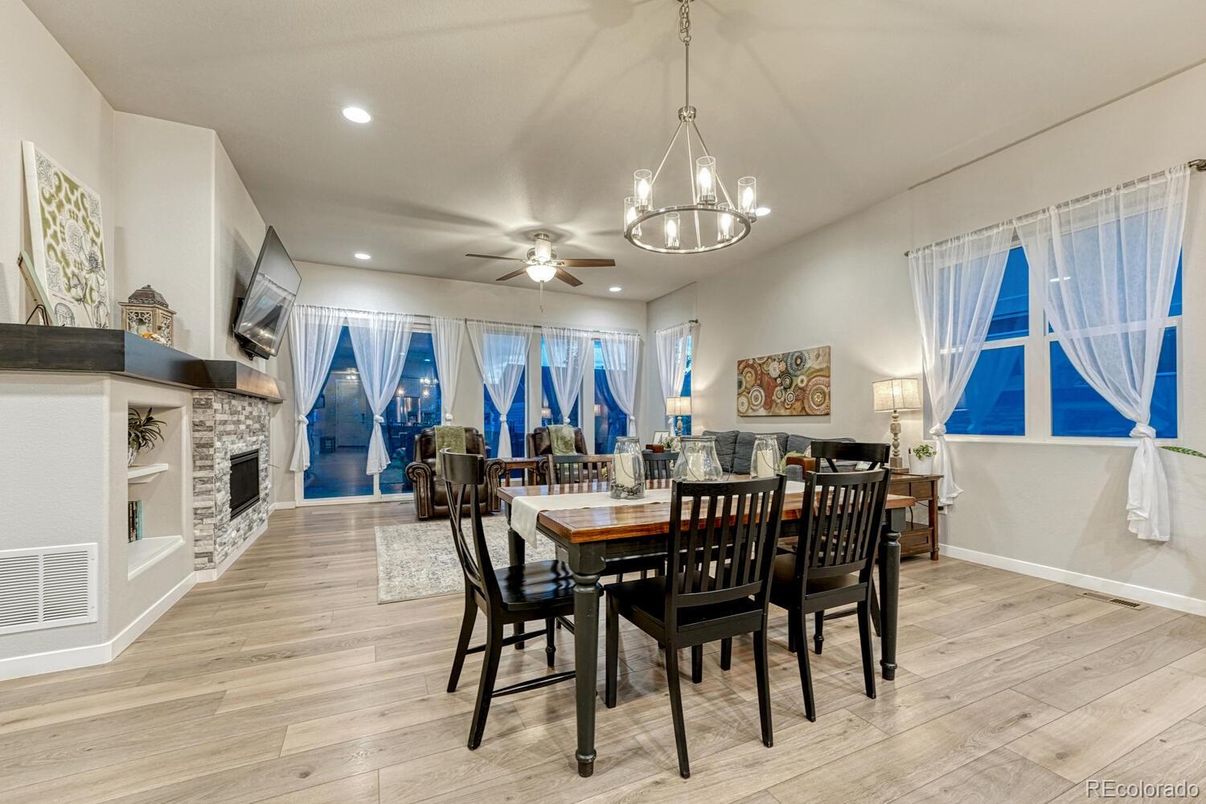 Dining room, Fireplace, Interior, Pendant Lights, Recessed Lighting, Wood Texture Flooring
