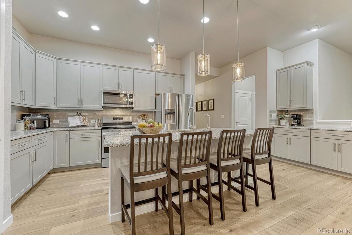 Interior, Kitchen, Pendant Lights, Recessed Lighting, Stainless Steel Appliances, Wood Texture Flooring