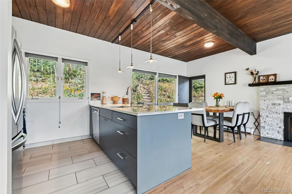 Dining room, Fireplace, Interior, Kitchen, Pendant Lights, Recessed Lighting, Wooden Beams, Wooden Ceilings, Wood Texture Flooring