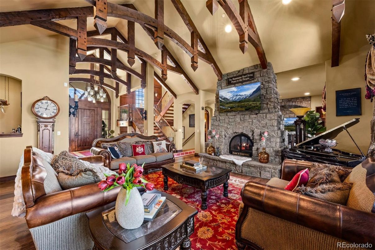 Fireplace, Interior, Living room, Piano, Recessed Lighting, Stone Walls, Wooden Beams, Wood Texture Flooring