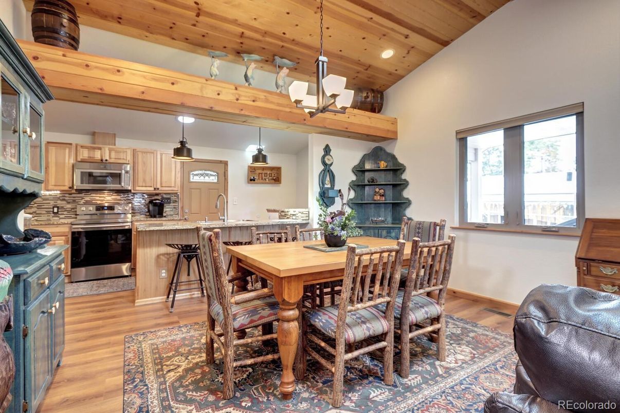 Dining room, Interior, Kitchen, Pendant Lights, Recessed Lighting, Stainless Steel Appliances, Wooden Beams, Wooden Ceilings, Wood Texture Flooring
